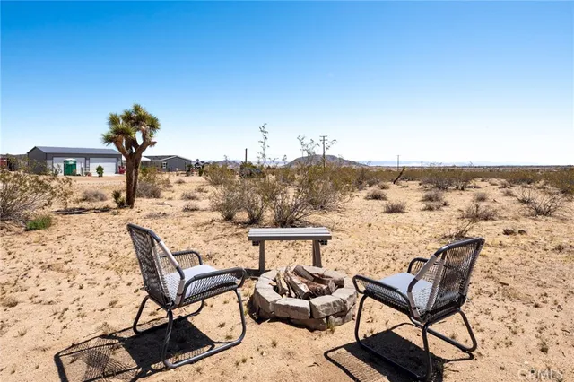 a view of a terrace with wooden floor and city view