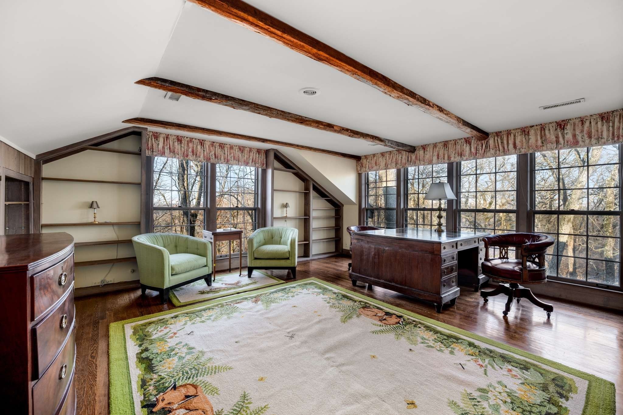 360 Vaughn Road Nashville, TN 37221 - Photo 12 of 34 a living room with furniture a flat screen tv and a large window