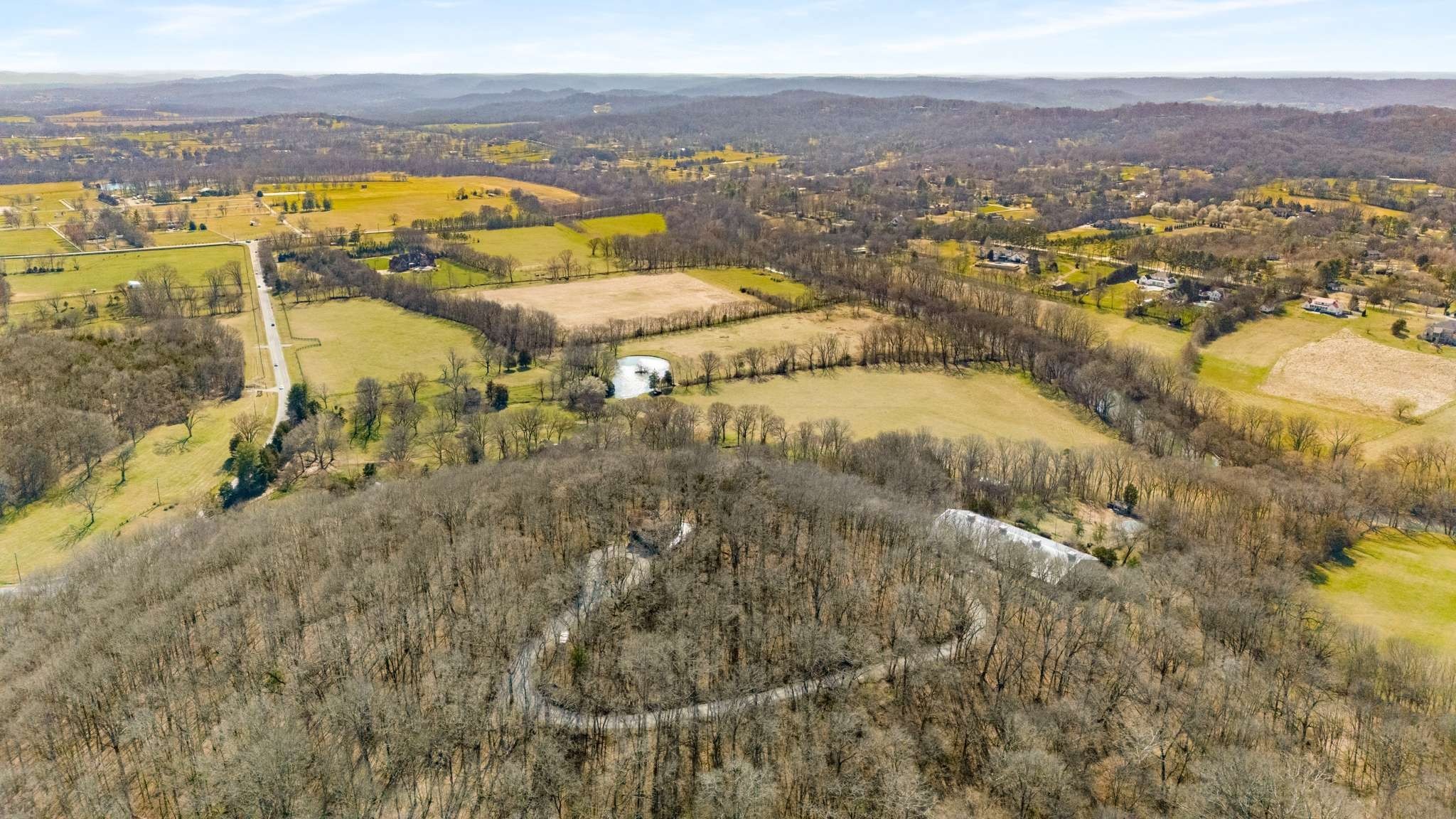 360 Vaughn Road Nashville, TN 37221 - Photo 23 of 34 a view of a city with mountains in the background
