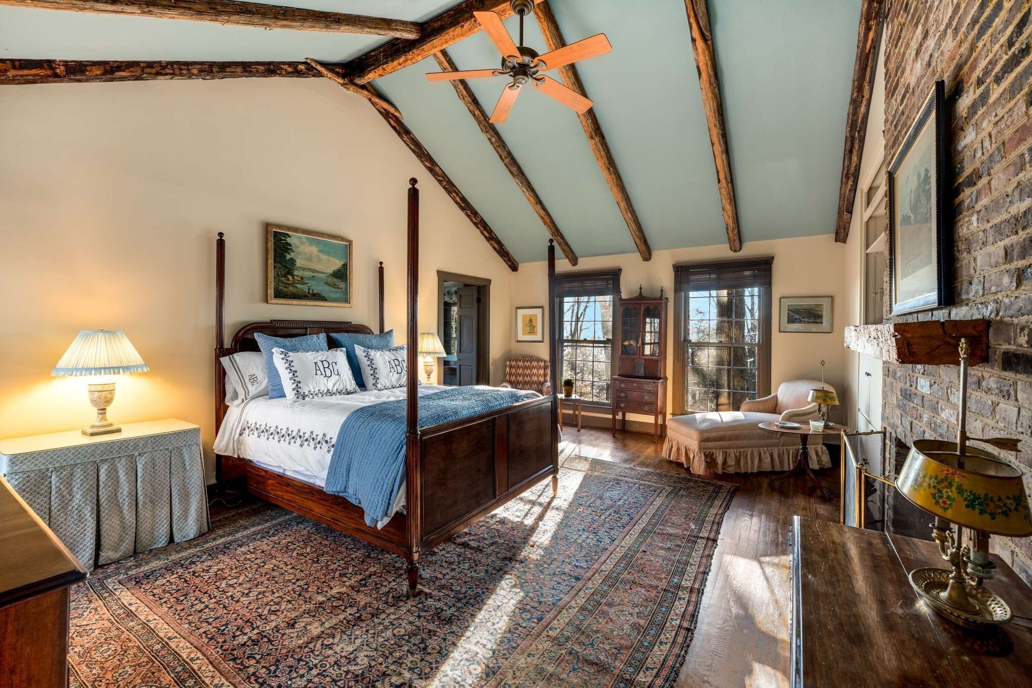 360 Vaughn Road Nashville, TN 37221 - Photo 7 of 34 a spacious bedroom with a bed couch and a window