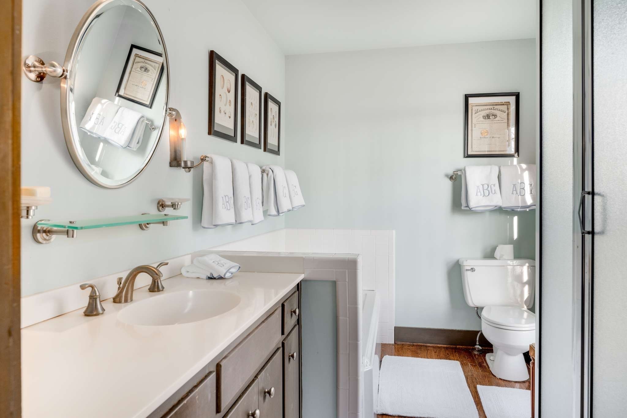 360 Vaughn Road Nashville, TN 37221 - Photo 9 of 34 a bathroom with a sink toilet and a mirror