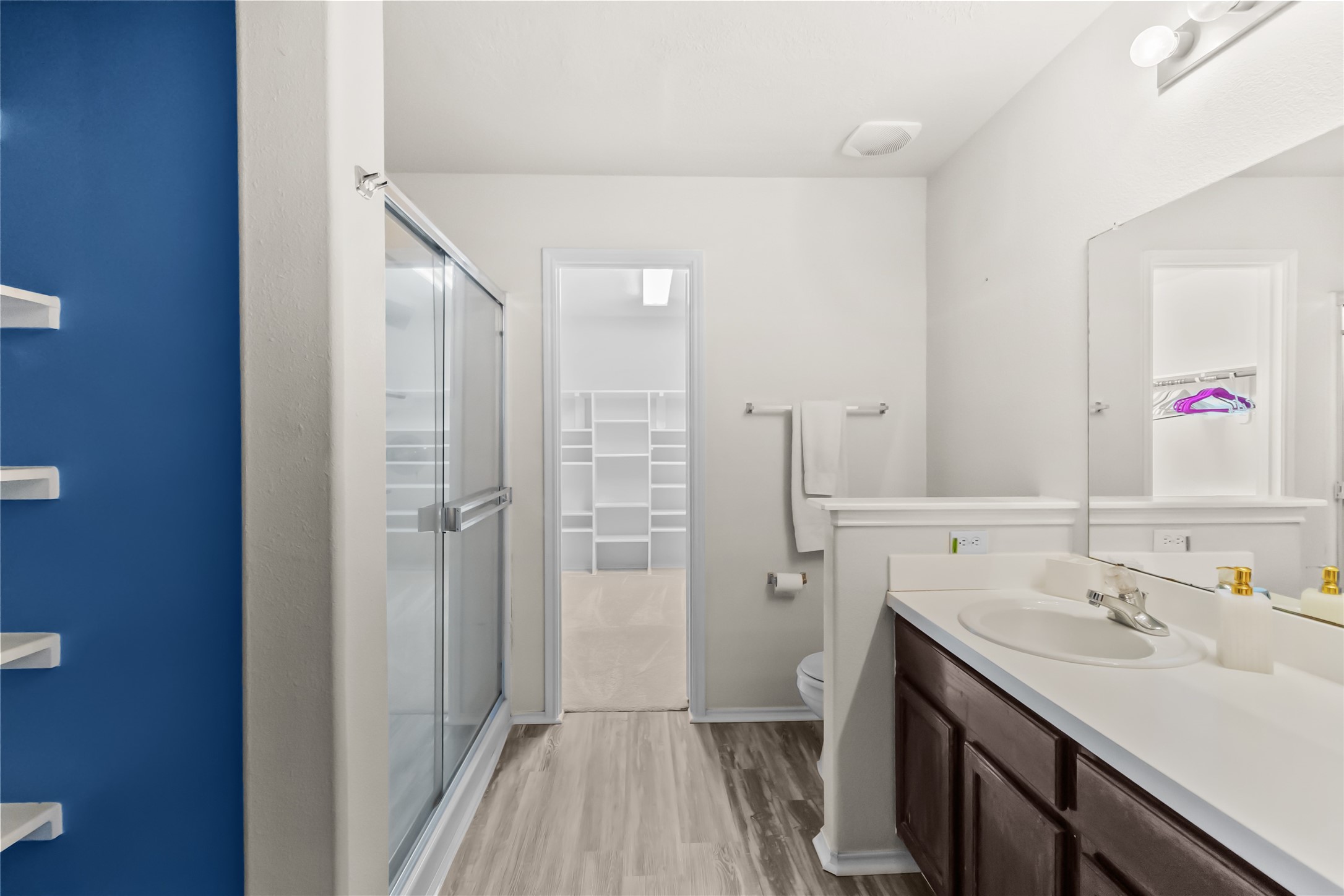 615 Ashlen Drive Houston, TX 77073 - Photo 13 of 35 This additional vanity view highlights how practical and spacious the bathroom truly is, with ample counter space, full mirrors, and storage that keeps everything neatly in place. It’s a setup that works just as well for slow mornings as it does for busy days.