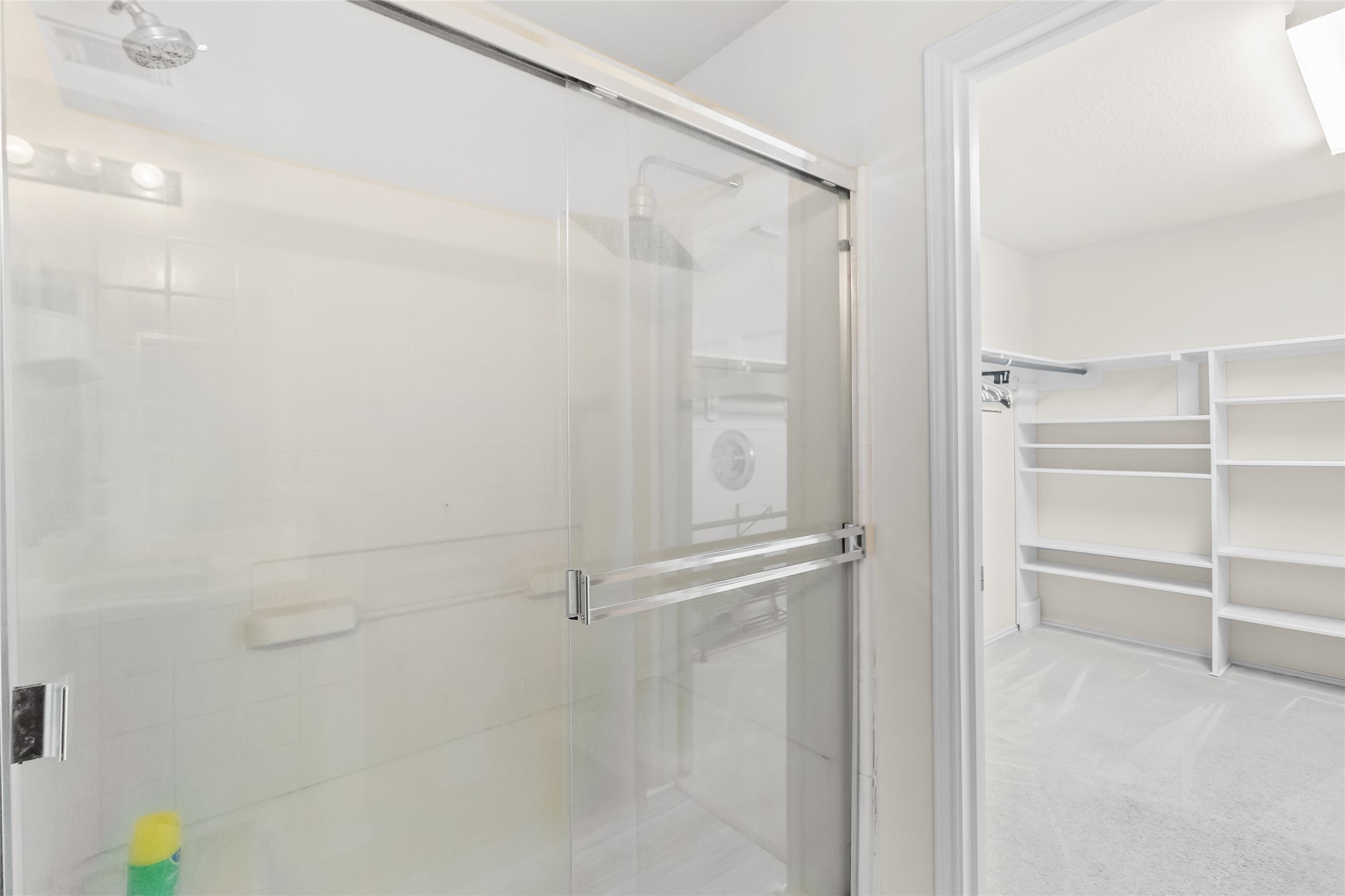 615 Ashlen Drive Houston, TX 77073 - Photo 14 of 35 Your walk-in shower features sleek glass doors and a clean, modern design that makes the space feel spa-like and uncluttered. The layout gives you comfort and functionality without sacrificing style.