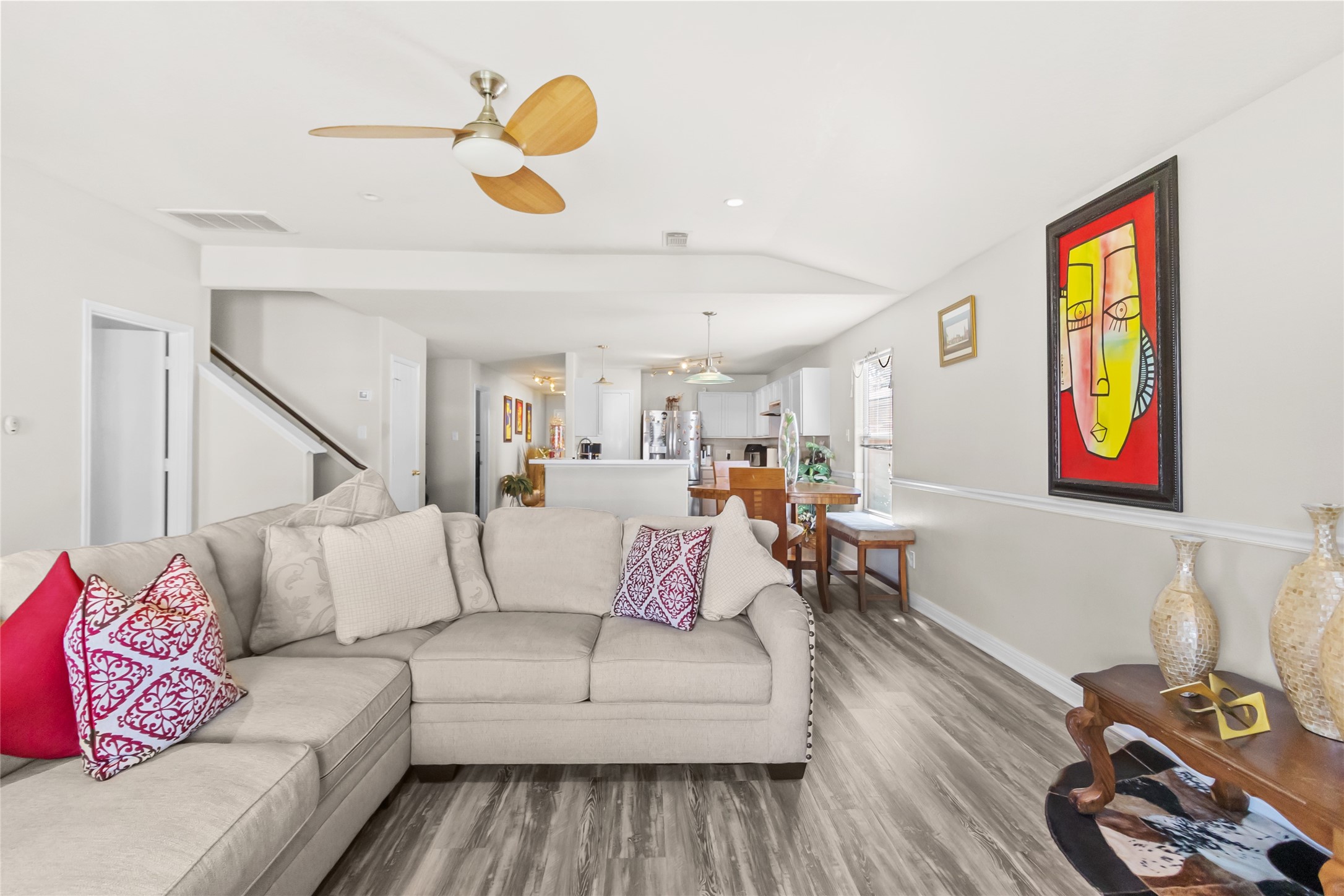 615 Ashlen Drive Houston, TX 77073 - Photo 2 of 35 This view highlights the seamless flow from your private sleeping area into the rest of the home, making mornings feel easy and unhurried. Clean lines, soft tones, and an open feel create a space that works just as well for winding down as it does for starting your day.