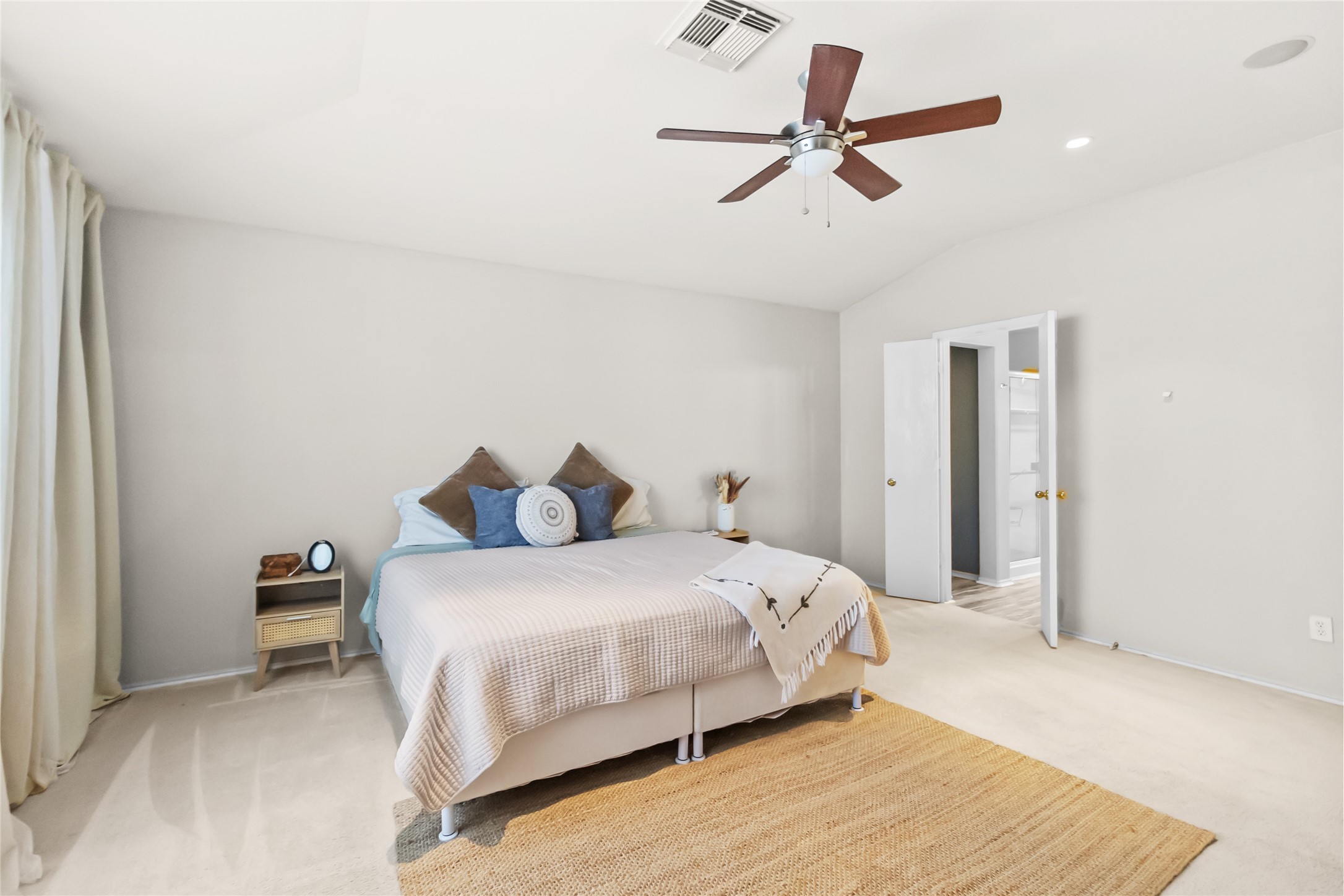 615 Ashlen Drive Houston, TX 77073 - Photo 25 of 35 From this angle, you really feel how open and airy the room is. Natural light fills the space, giving you flexibility for furniture placement while still leaving plenty of breathing room to keep things simple and uncluttered.
