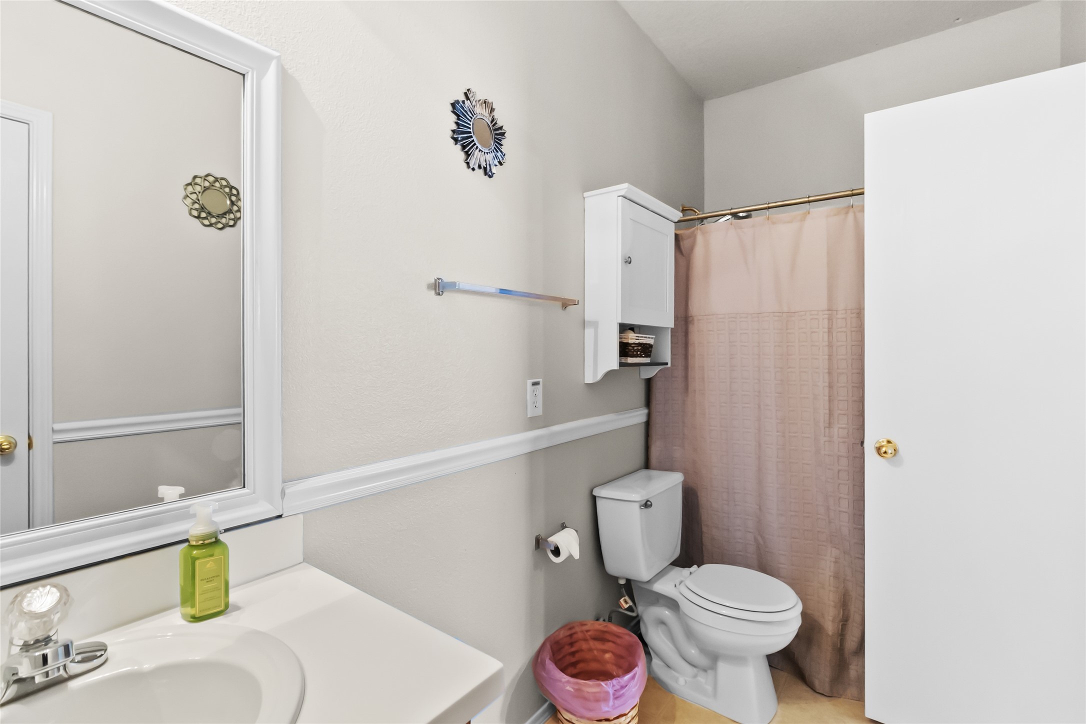 615 Ashlen Drive Houston, TX 77073 - Photo 28 of 35 From this angle, you really see how practical this bathroom is—simple finishes, neutral tones, and a layout that keeps things efficient and clutter-free. It’s the kind of space that just works, day in and day out.