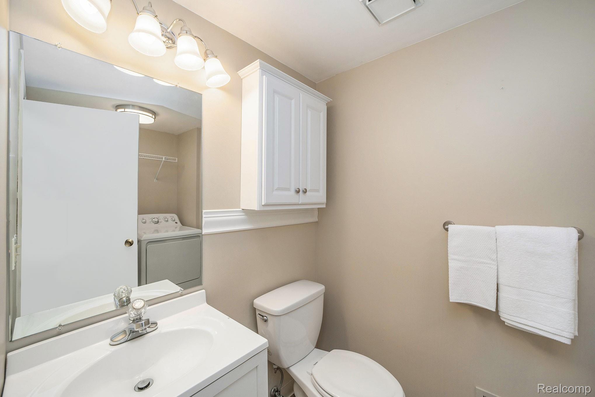 349 South Crooks Road, Unit 5 Clawson, MI 48017 - Photo 12 of 24 Half Bath and Laundry