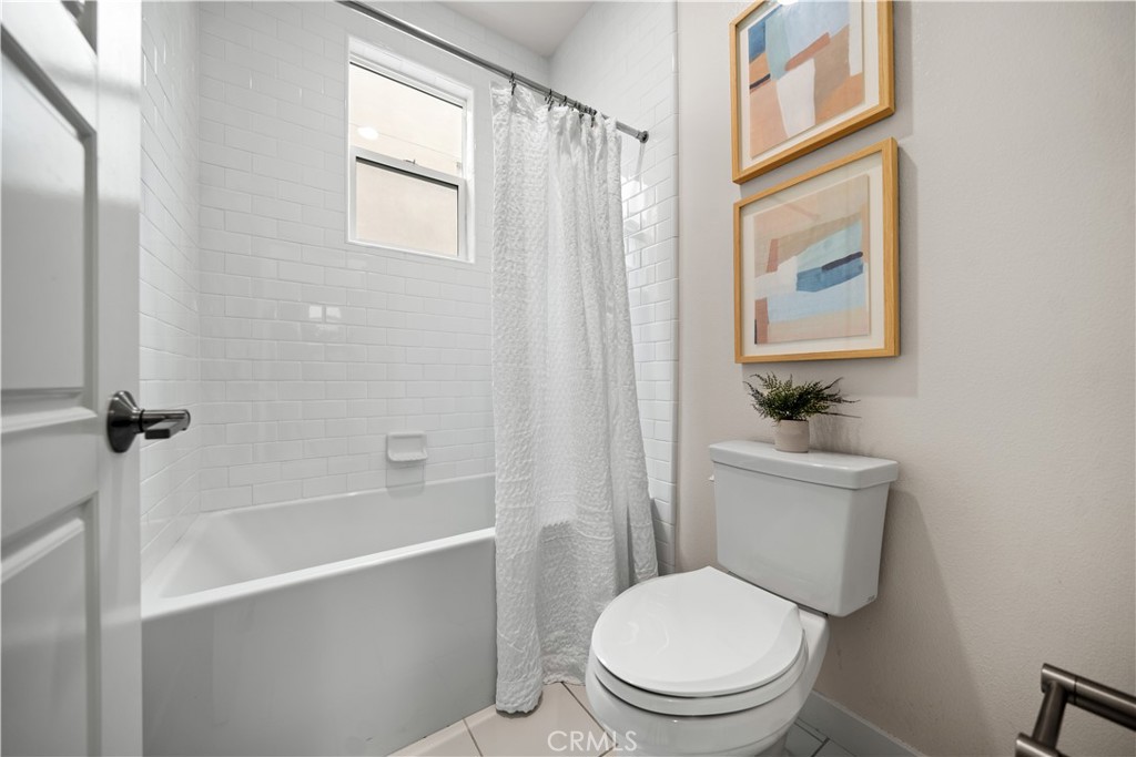 116 Newall Irvine, CA 92618 - Photo 23 of 45 a white toilet sitting next to a bath tub