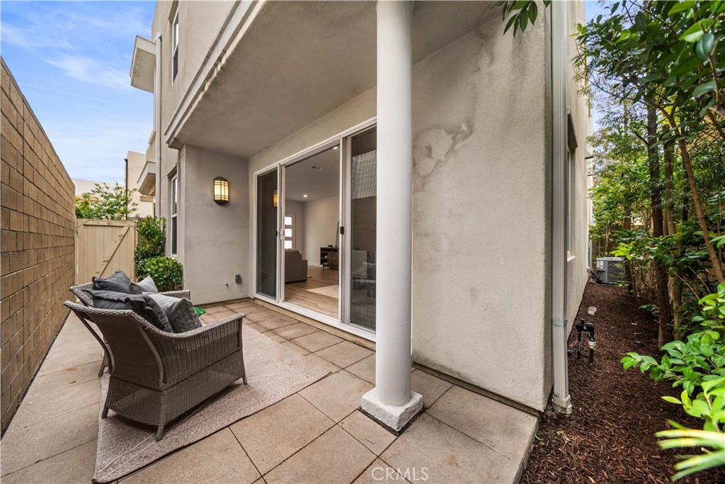116 Newall Irvine, CA 92618 - Photo 35 of 45 a living room with furniture and a potted plant