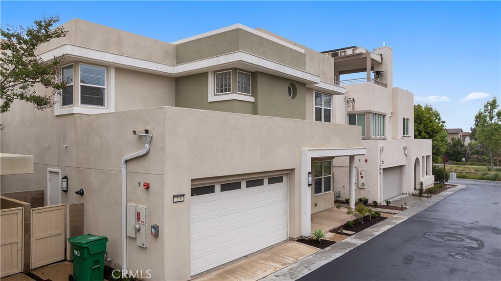 116 Newall Irvine, CA 92618 - Photo 38 of 45 a front view of a house with a yard