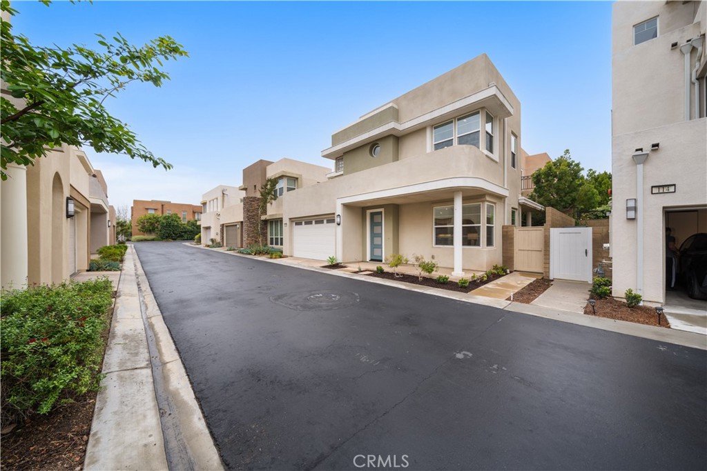 116 Newall Irvine, CA 92618 - Photo 41 of 45 a front view of a house with a yard
