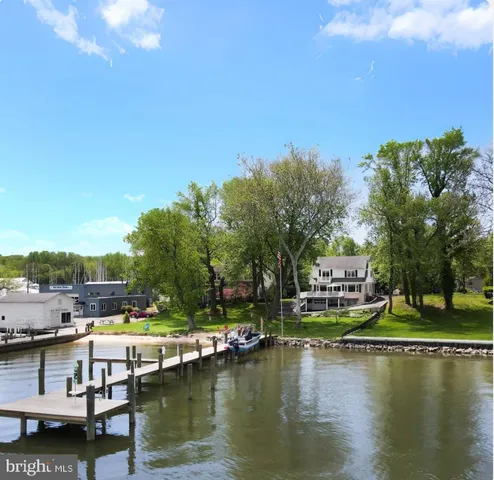 a view of a lake with a house