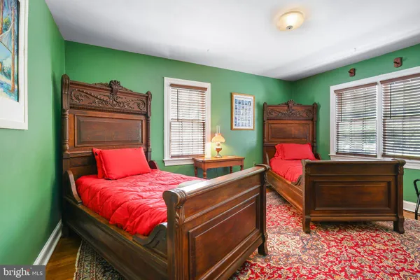 a bedroom with a bed and furniture