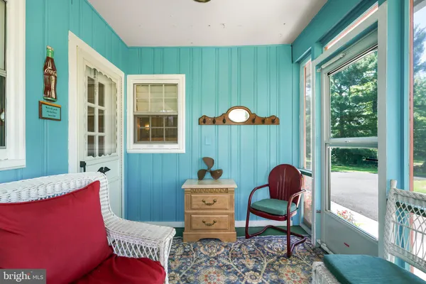 a room with furniture and a window