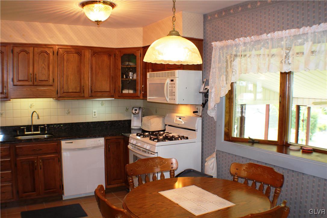 3940 Rutland Road Bethlehem, PA 18020 - Photo 8 of 27 There is original hardwood beneath the newer kitch