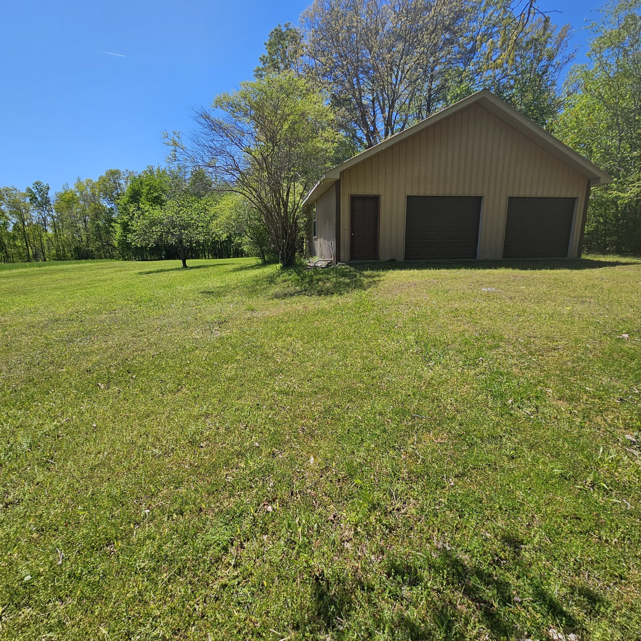 0 Young Green Road Smithville, TN 37166 - Photo 7 of 37 a front view of house with yard and trees