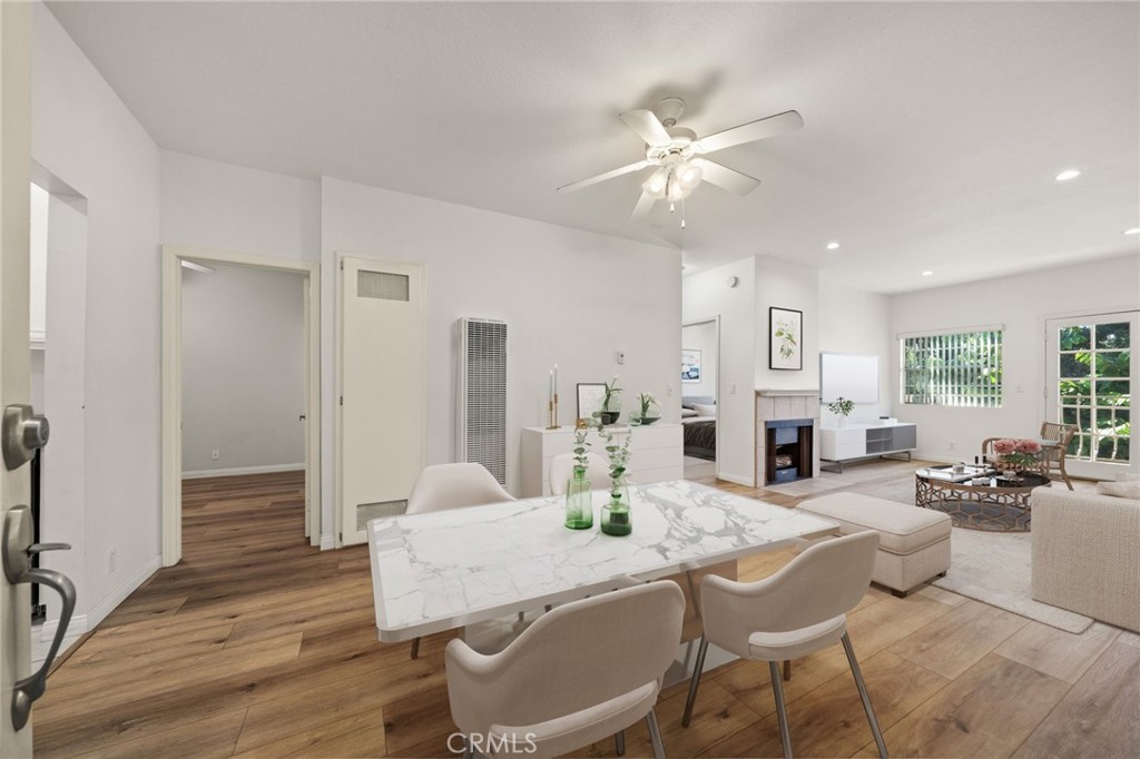 1145 Roswell Avenue, Unit 204 Long Beach, CA 90804 - Photo 4 of 14 a view of a dining room with furniture window and wooden floor