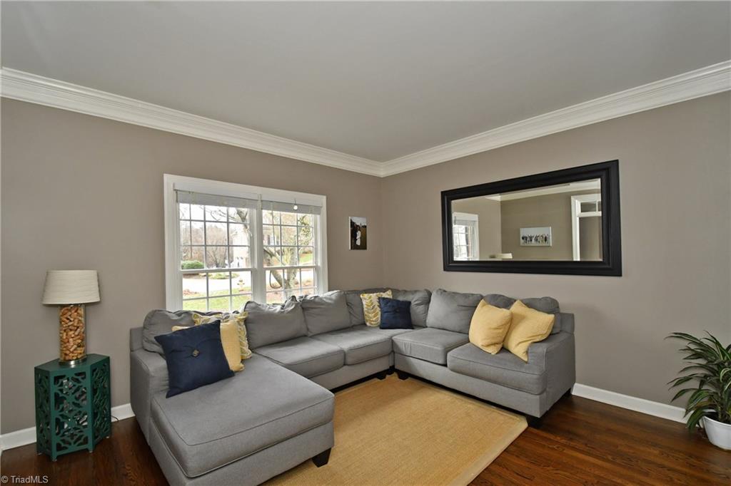 125 Windrush Road Winston-Salem, NC 27106 - Photo 3 of 23 Living Room with Hardwood Floors & Deep Moldings