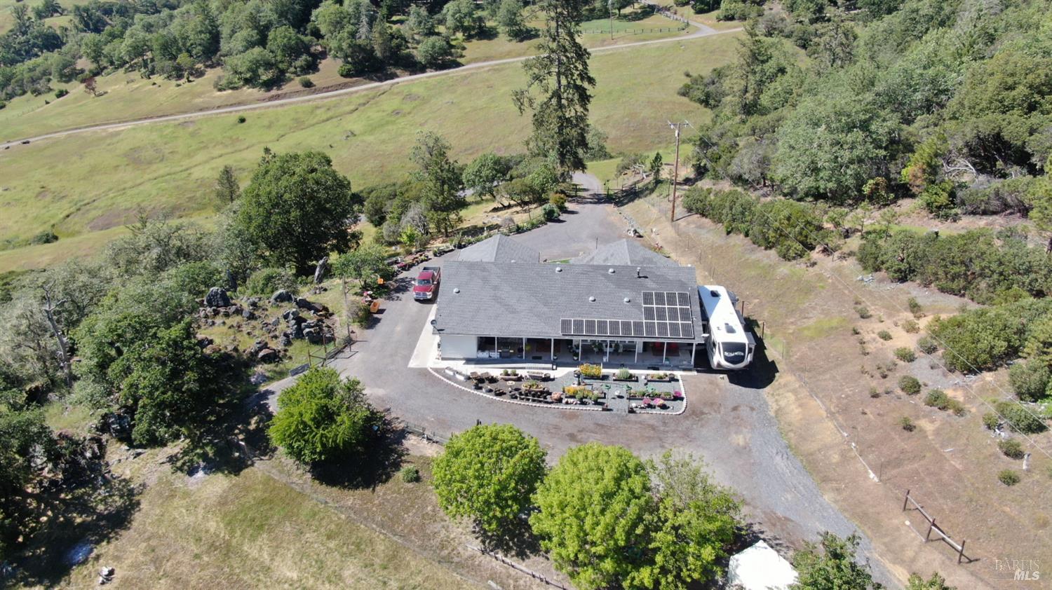 3970 Canyon Road Willits, CA 95490 - Photo 42 of 73 an aerial view of a house with a yard and lake view