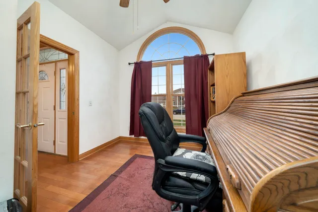 a view of a livingroom with furniture and entryway