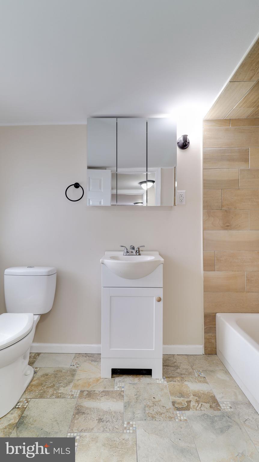 519 Back Neck Road Bridgeton, NJ 08302 - Photo 12 of 12 a bathroom with a sink toilet and shower