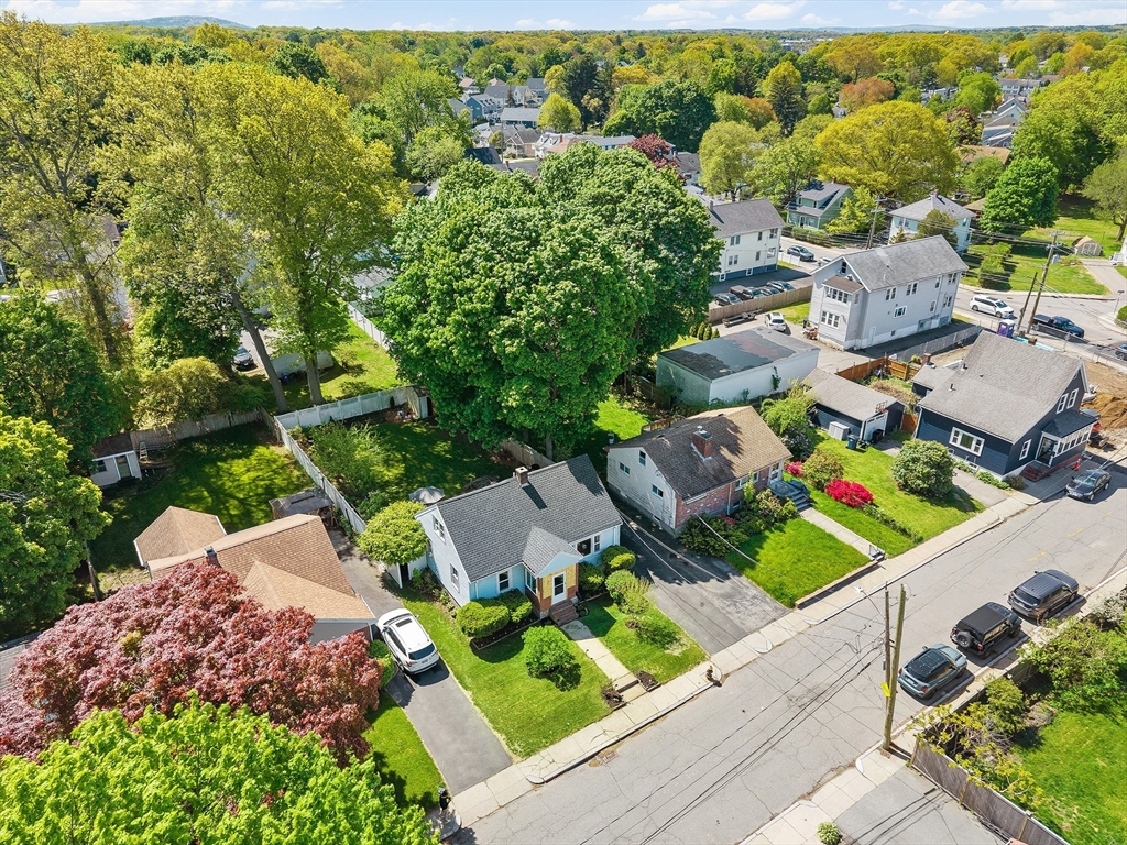 11 Hartlawn Road Boston, MA 02132 - Photo 31 of 34 an aerial view of a house with a yard