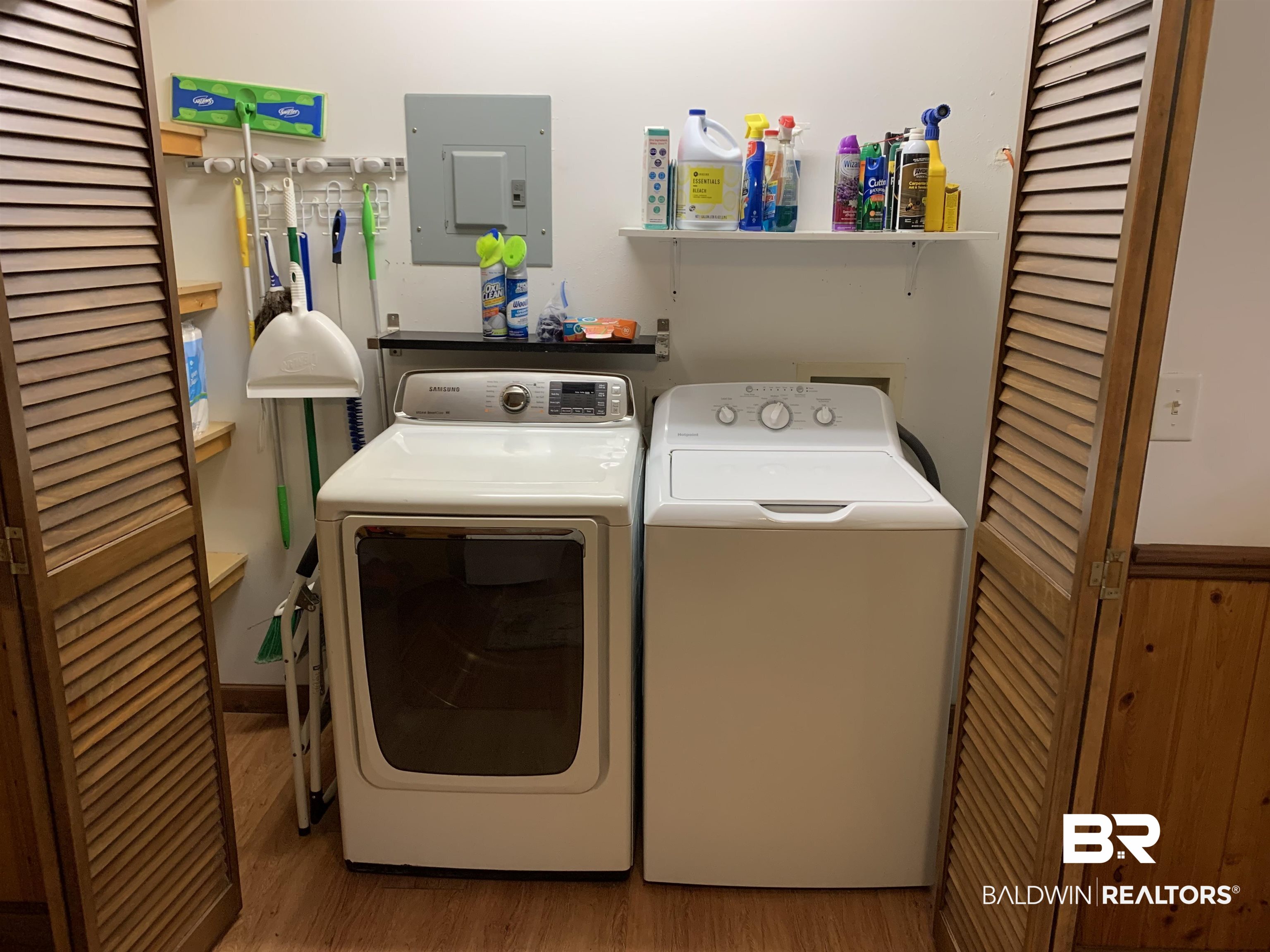 465 Rock Creek Road Wing, AL 36483 - Photo 11 of 15 Clothes washing area with electric panel, hardwood / wood-style flooring, and independent washer and dryer