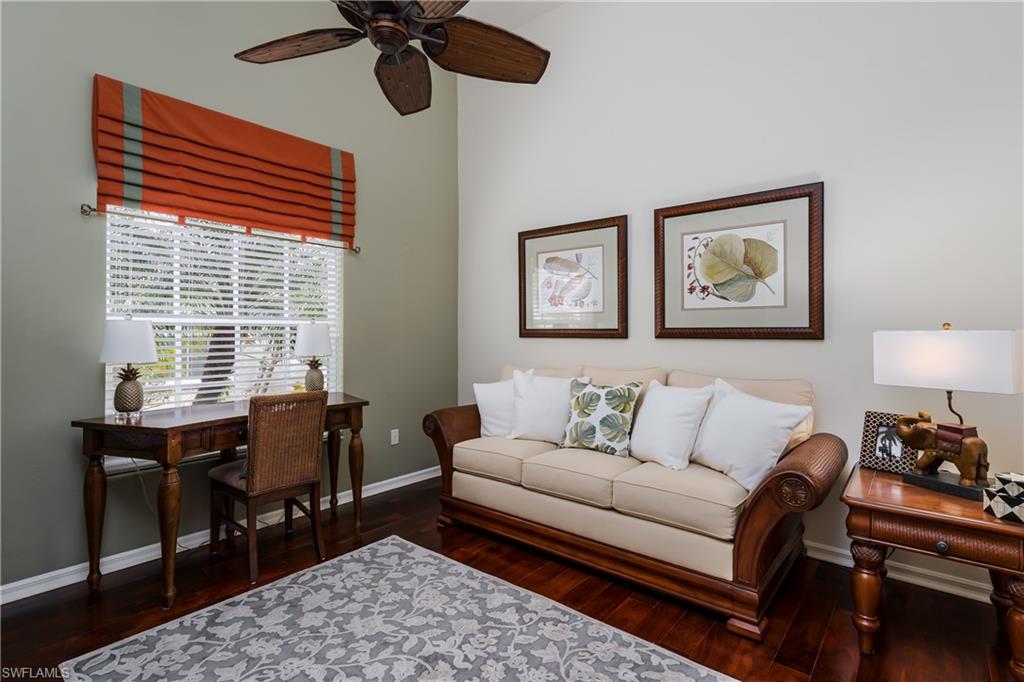 6658 Castlelawn Place, Unit 9 Naples, FL 34113 - Photo 23 of 38 Cream-toned walls complement light-colored carpet flooring