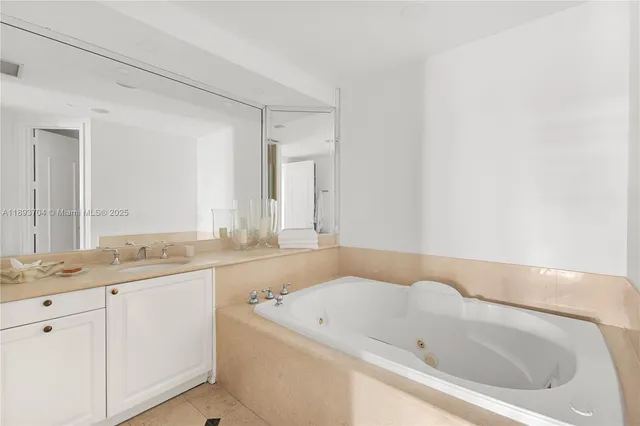 a bathroom with a sink and a bathtub