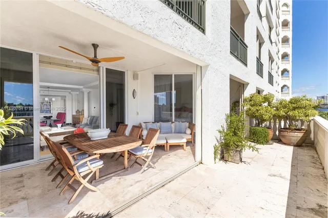 a outdoor space with lots of tables and chairs