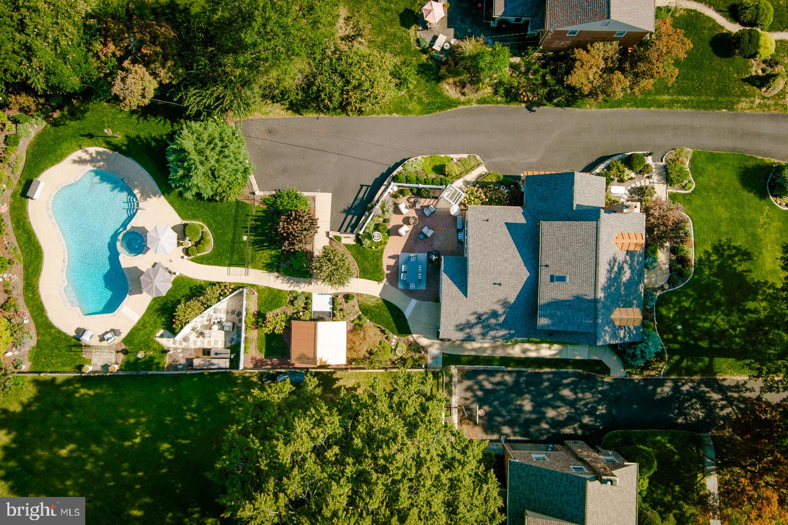 Serene suburban oasis with poolside charm.