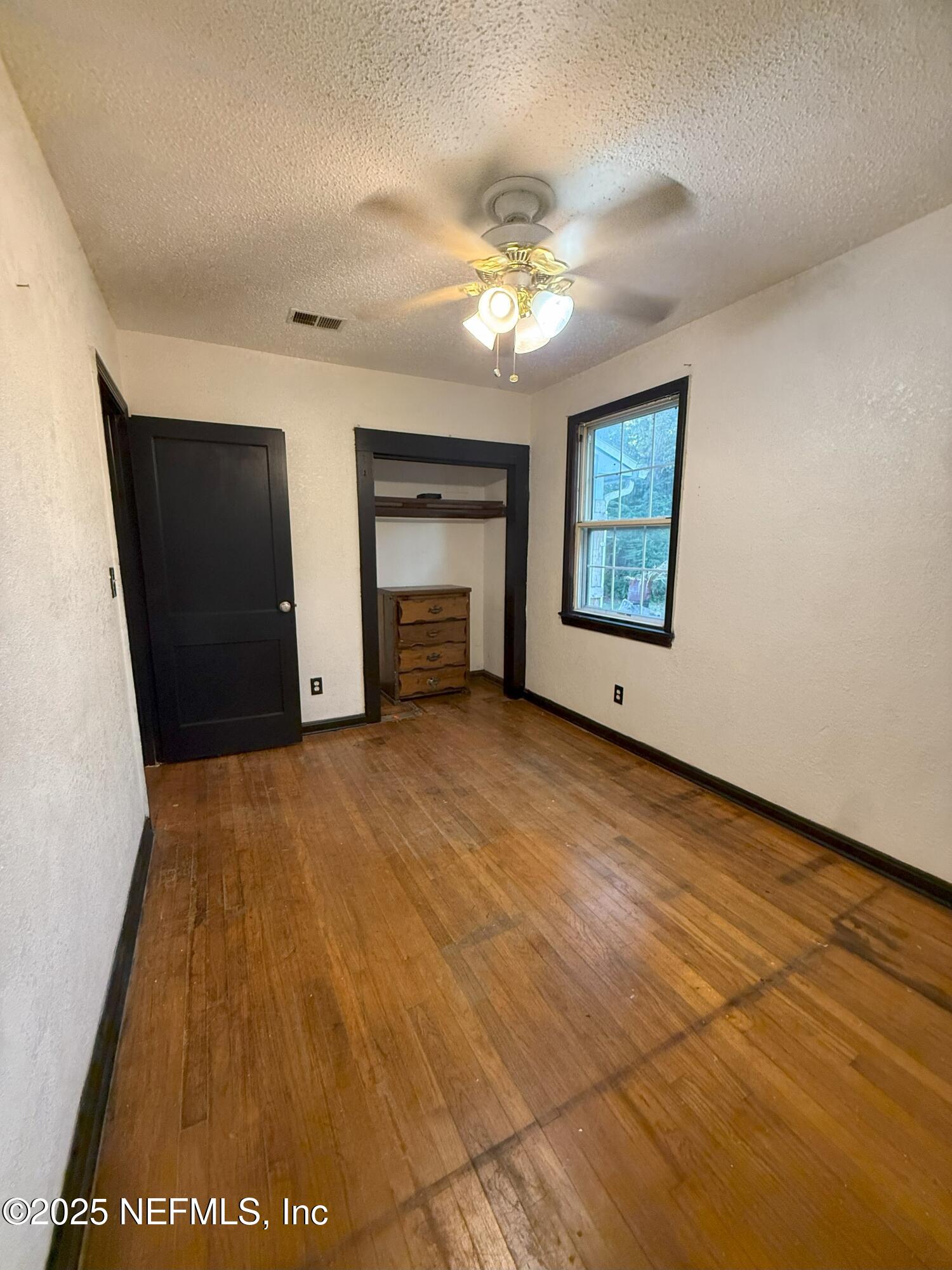 3546 Oleander Street Jacksonville, FL 32254 - Photo 13 of 32 a view of an empty room with a window