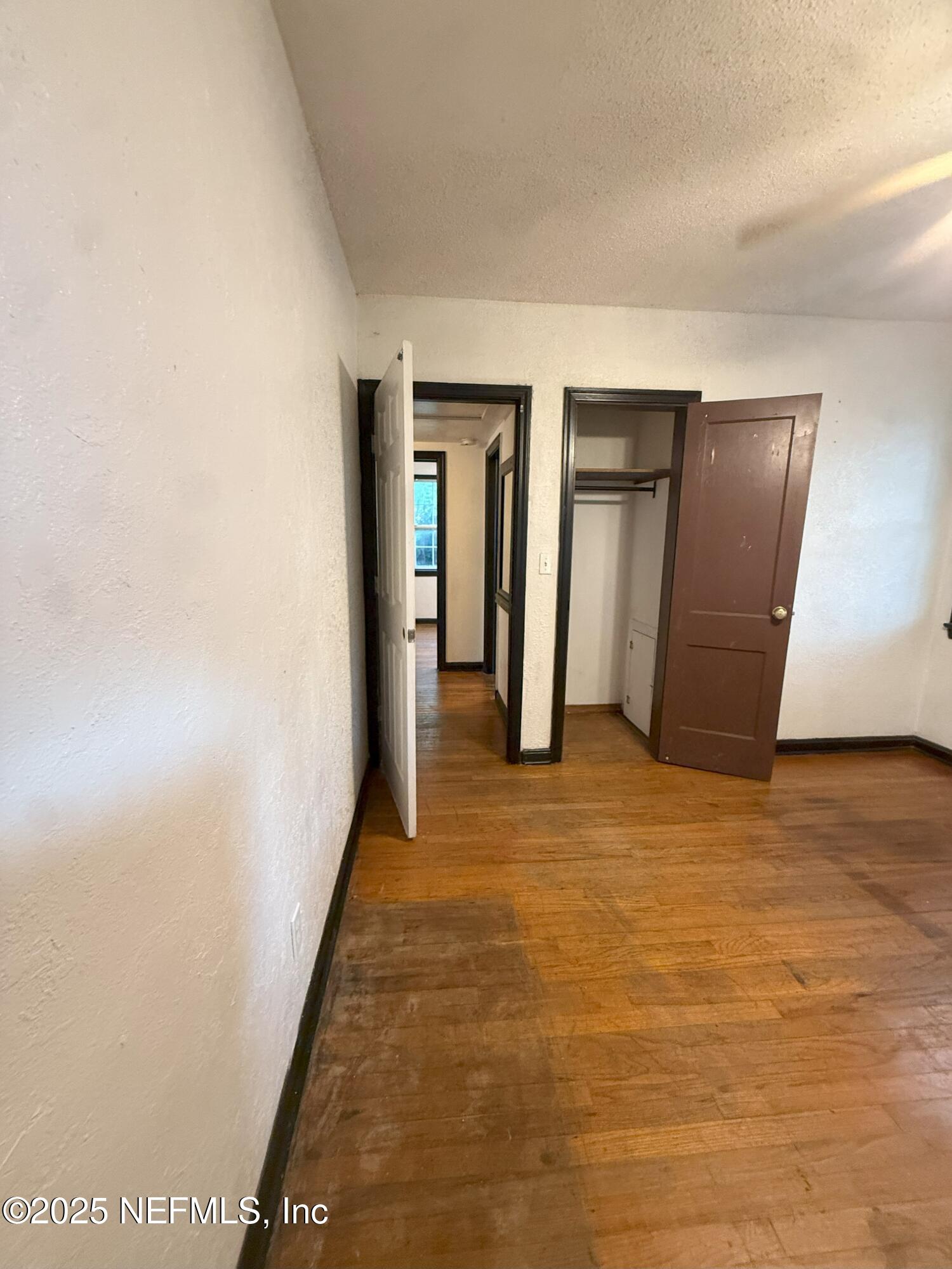 3546 Oleander Street Jacksonville, FL 32254 - Photo 16 of 32 a view of hallway with an empty room