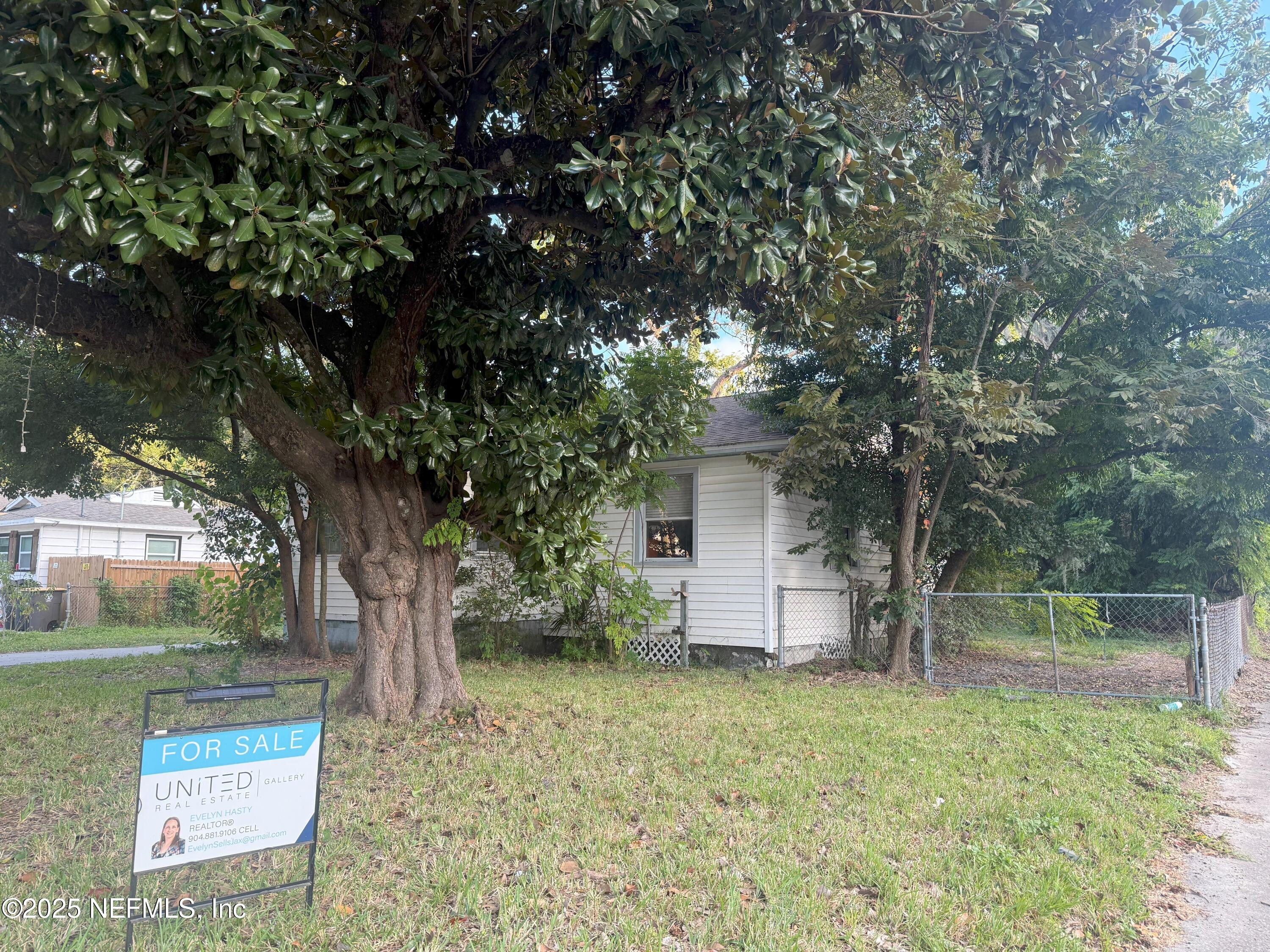 3546 Oleander Street Jacksonville, FL 32254 - Photo 27 of 32 a front view of a house with garden