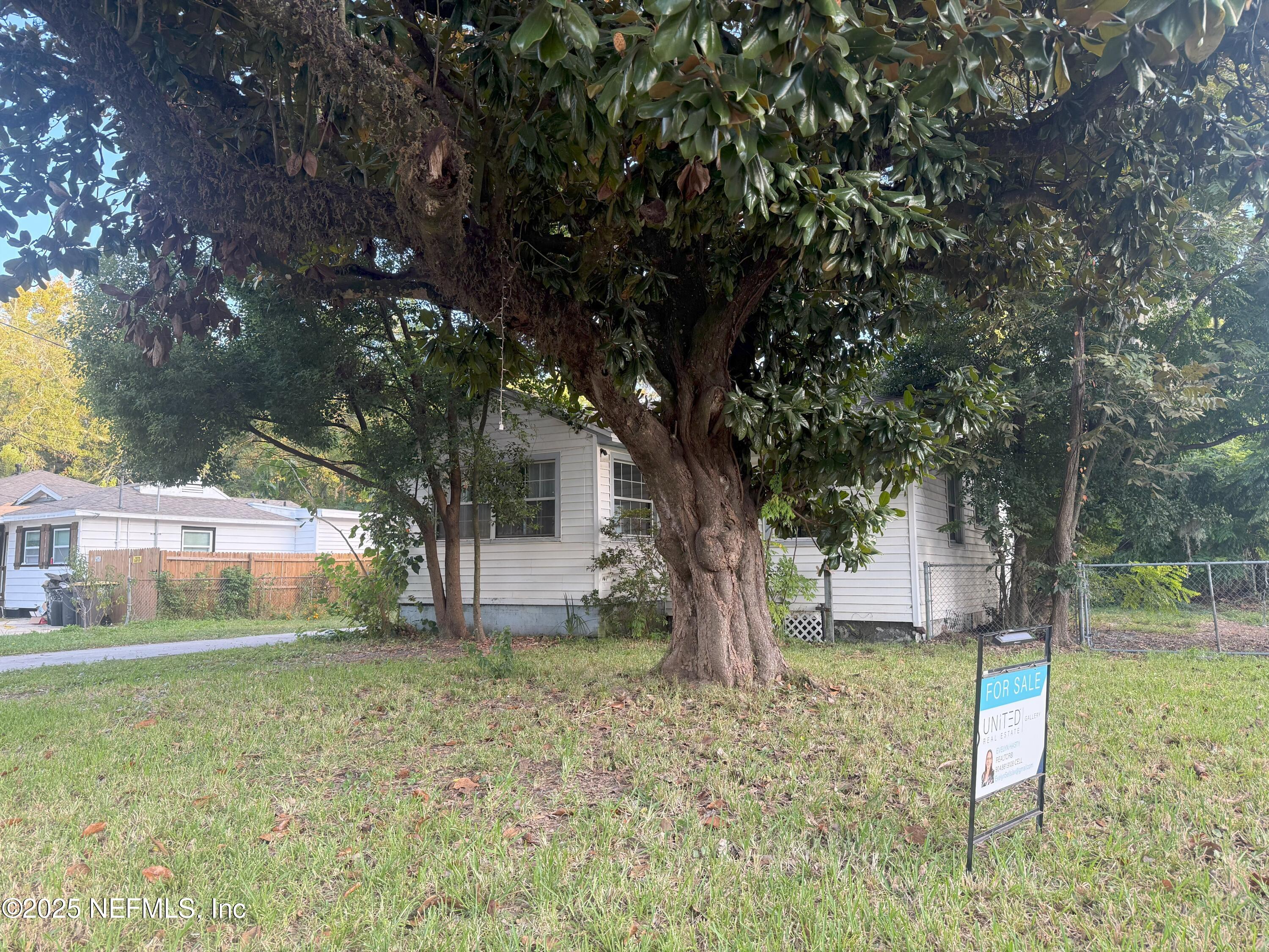 3546 Oleander Street Jacksonville, FL 32254 - Photo 28 of 32 a view of a house with a yard