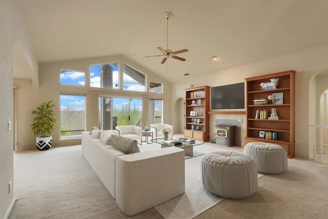 a kitchen with a refrigerator a sink and cabinets