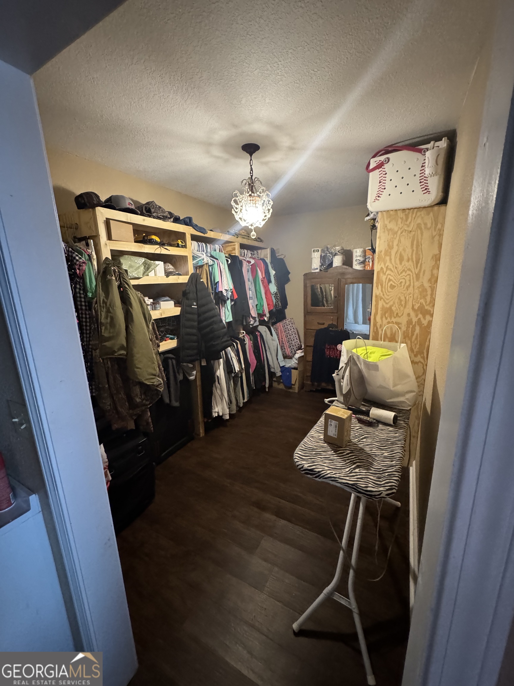 353 Mosley Road Vidalia, GA 30474 - Photo 9 of 14 a living room with furniture and a wooden floor