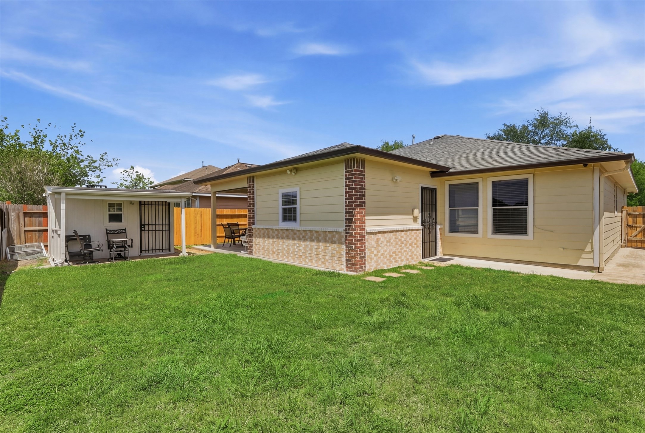 12638 Coho Lane Houston, TX 77045 - Photo 22 of 29 front view of a house with a yard