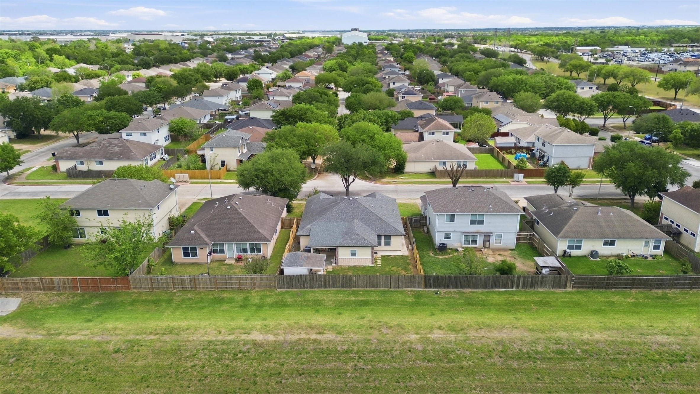 12638 Coho Lane Houston, TX 77045 - Photo 24 of 29 an aerial view of residential houses with outdoor space and trees