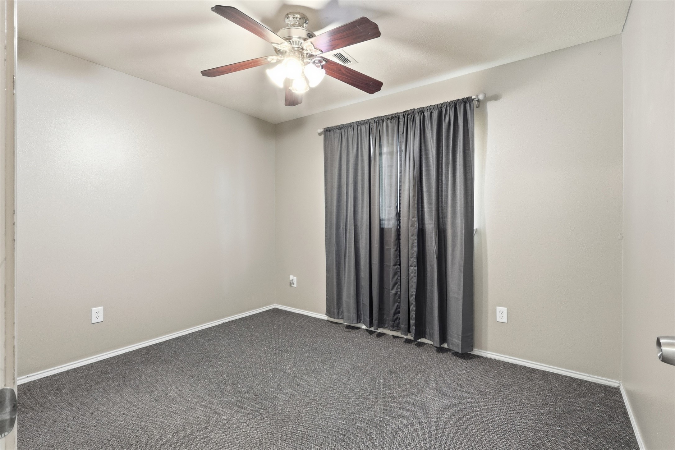 12638 Coho Lane Houston, TX 77045 - Photo 5 of 29 an empty room with fan