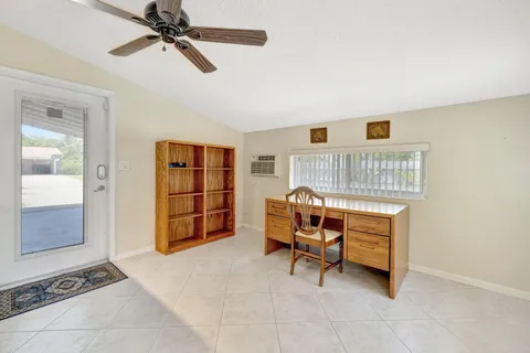 a view of a kitchen and a window