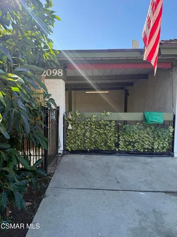 a view of a pathway along the building