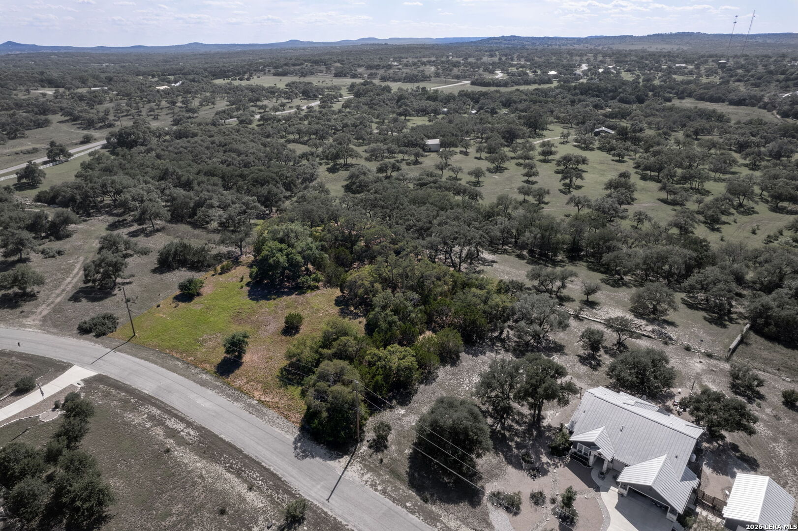 106 Riley Wood Blanco, TX 78606 - Photo 2 of 10 an aerial view of multiple house