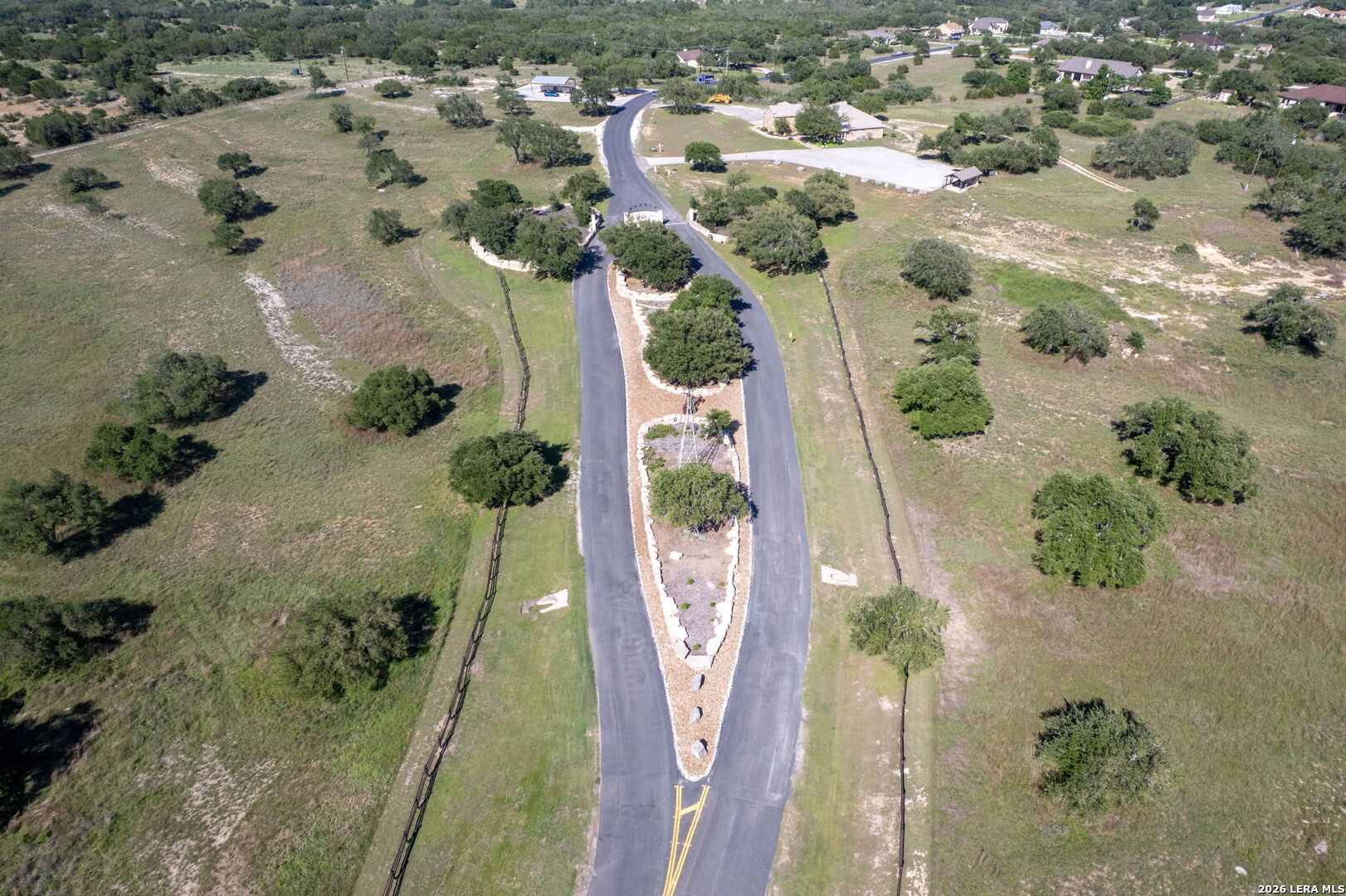 106 Riley Wood Blanco, TX 78606 - Photo 7 of 10 an aerial view of a house with a yard