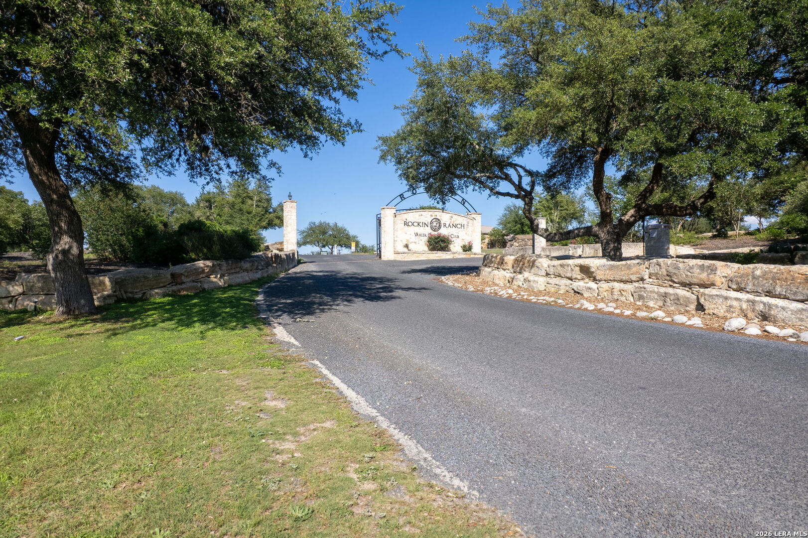 106 Riley Wood Blanco, TX 78606 - Photo 8 of 10 a view of a street with houses