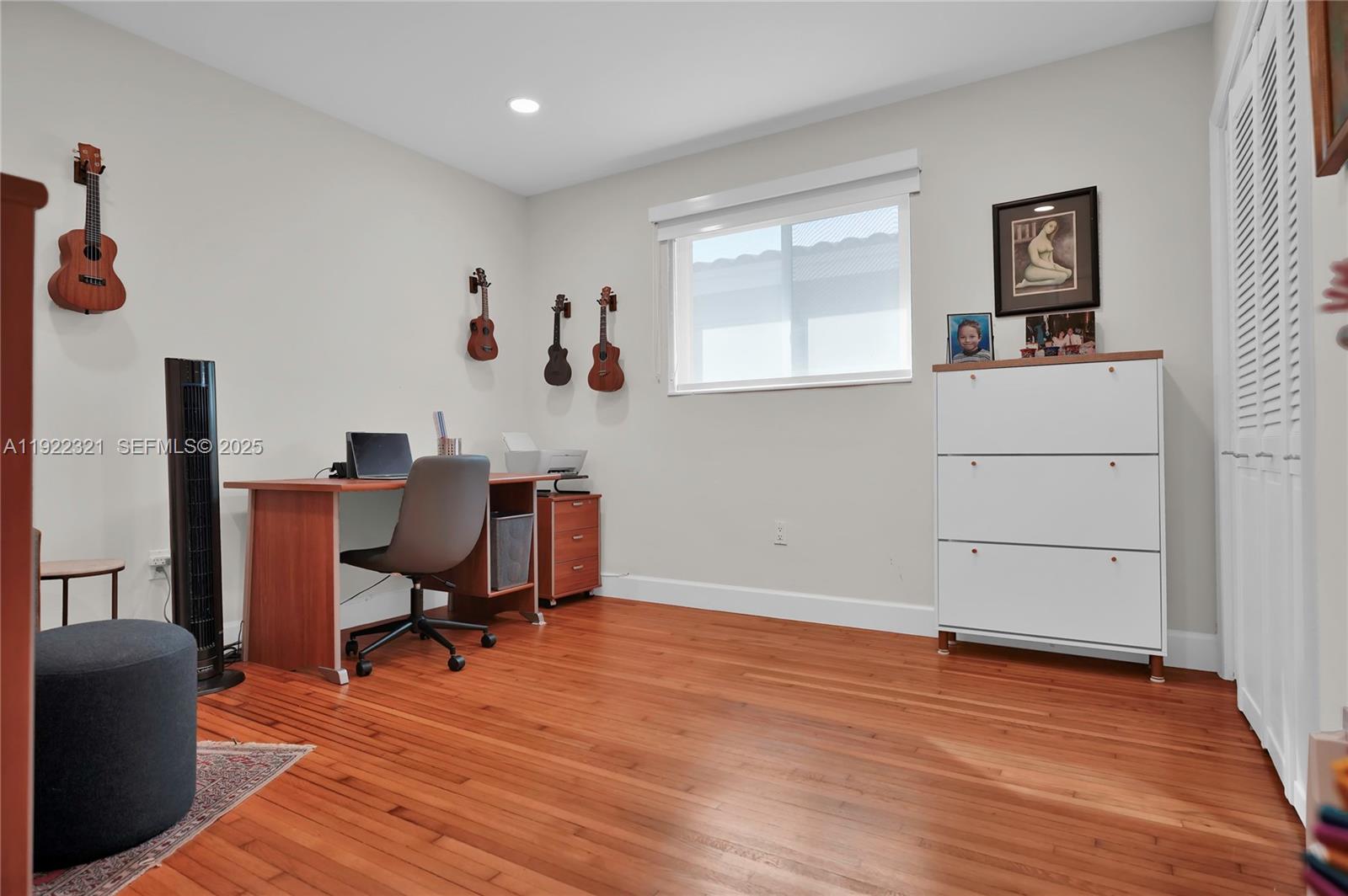1409 Bird Road Coral Gables, FL 33146 - Photo 17 of 36 a view of a workspace with furniture and a window