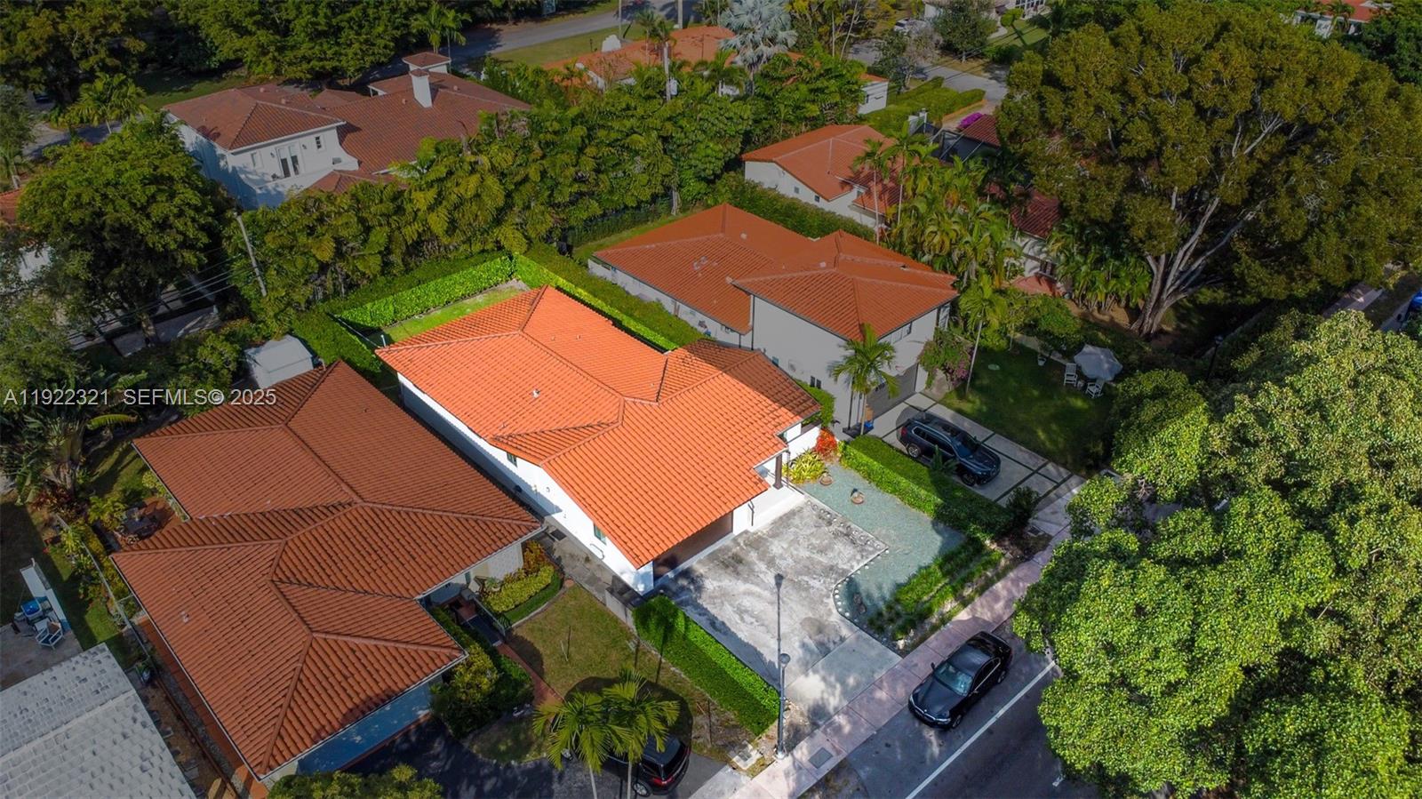 1409 Bird Road Coral Gables, FL 33146 - Photo 32 of 36 an aerial view of a house