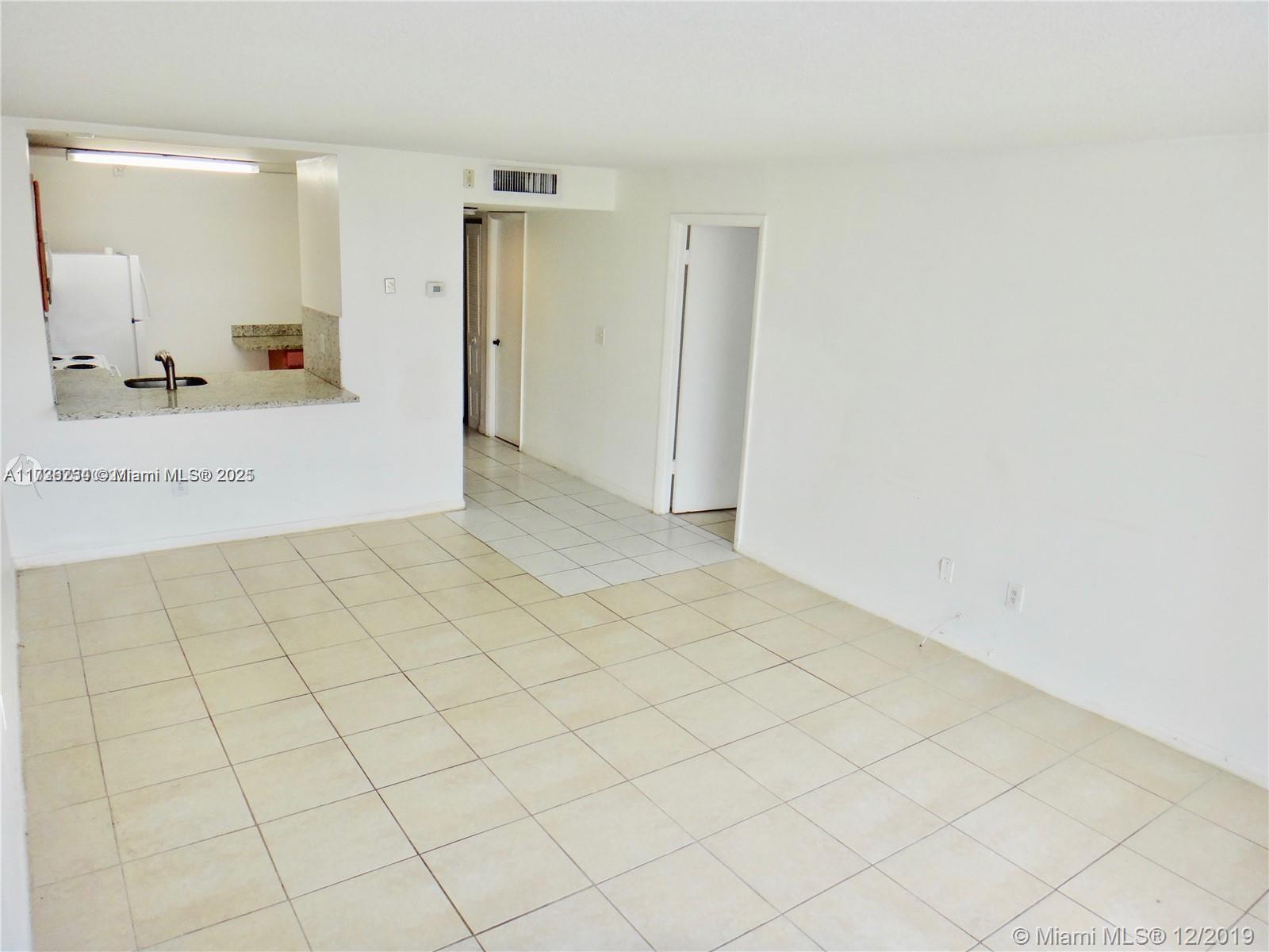 498 Northwest 165th Street, Unit D307 Miami, FL 33169 - Photo 4 of 24