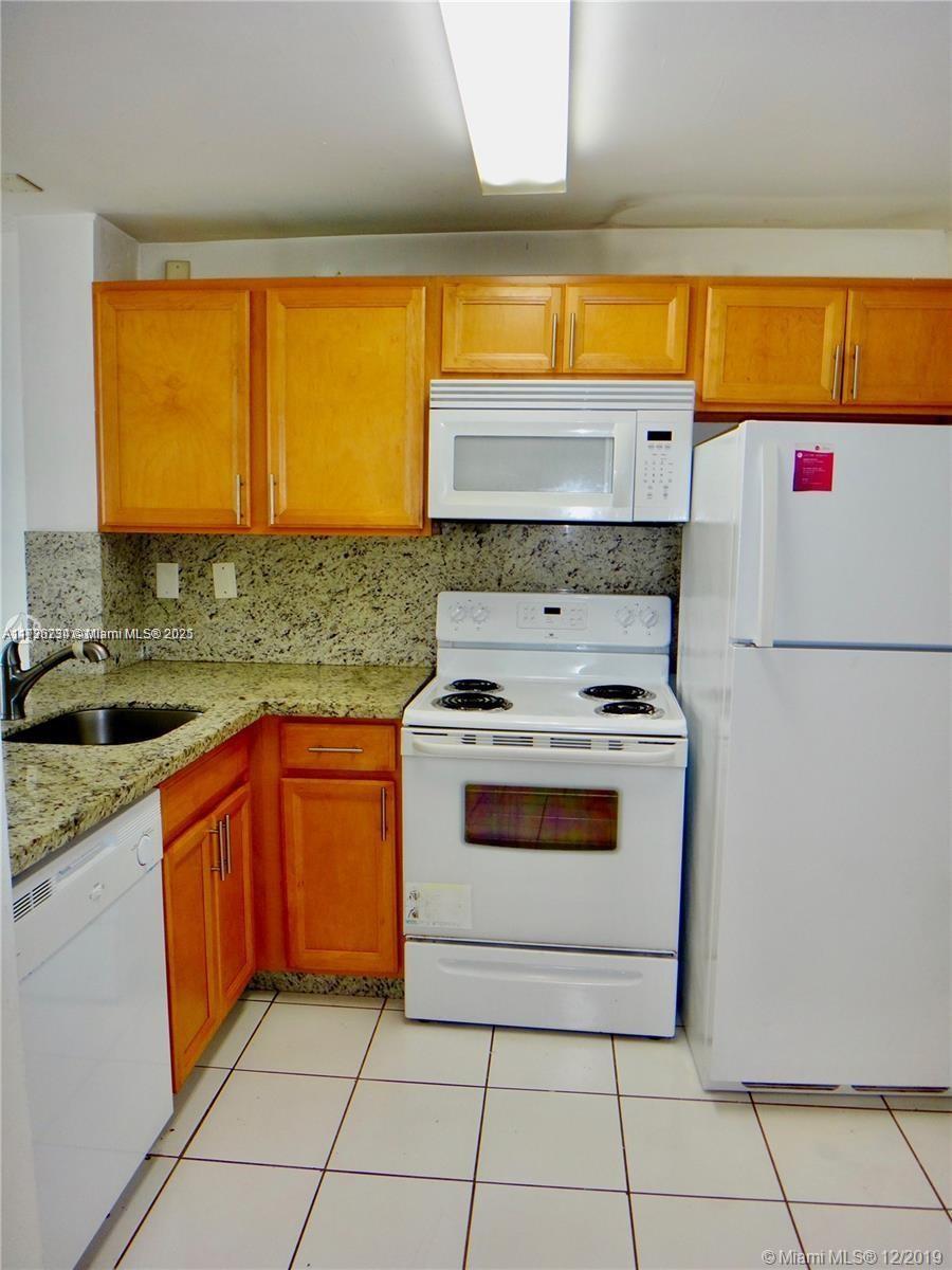 498 Northwest 165th Street, Unit D307 Miami, FL 33169 - Photo 7 of 24