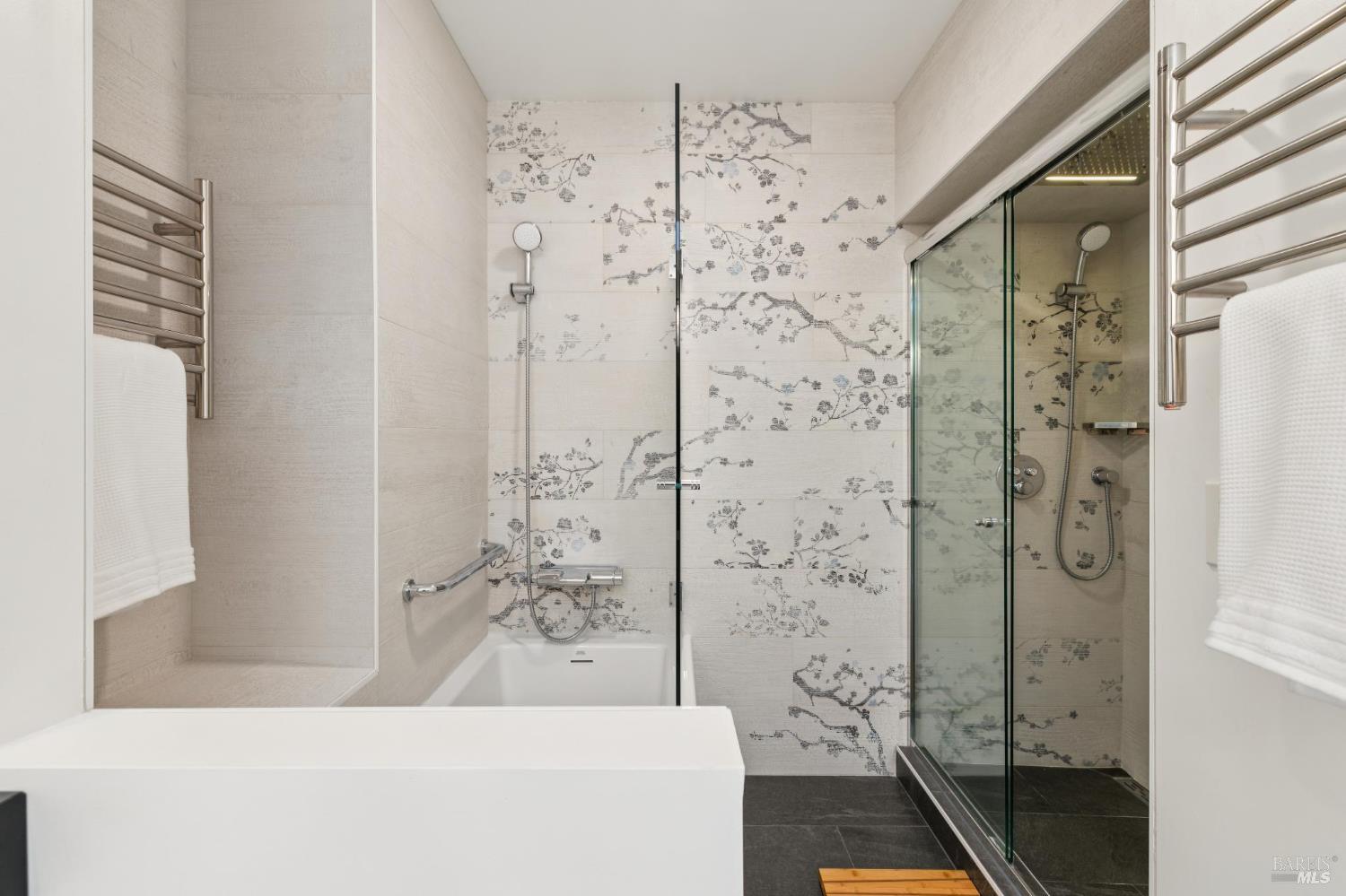 1045 Susan Way Novato, CA 94947 - Photo 45 of 62 Primary bathroom featuring a private soaking tub and a shower with artistic tilework.